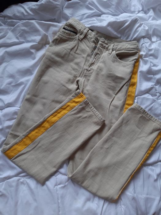 Jeansy beżowe Calvin Klein