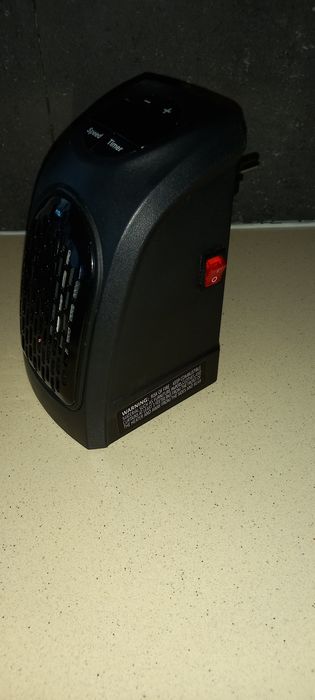 Aquecedor pessoal de cerâmica, Handy Heater