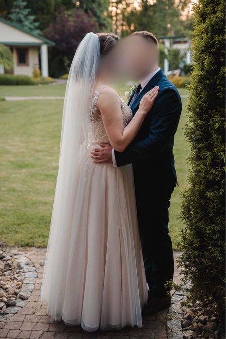 Sprzedam używaną suknię ślubną - szytą na wymiar