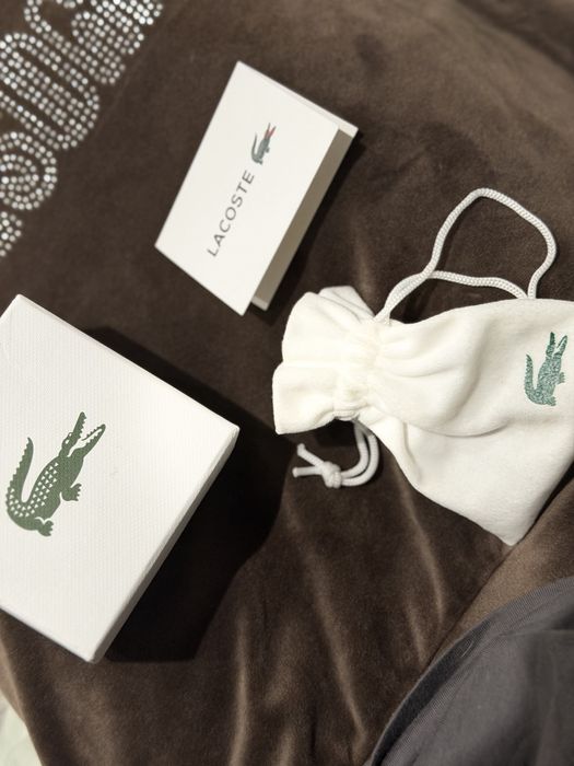 Стильні браслети Lacoste