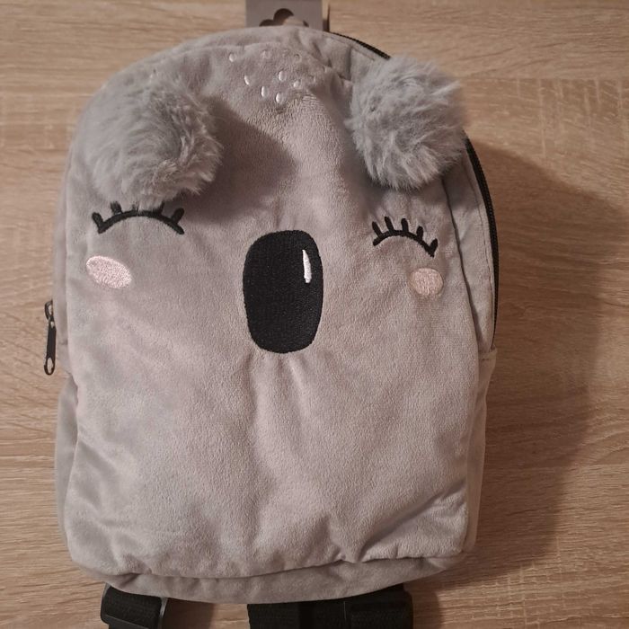Plecak koala z pomponami szary Reserved