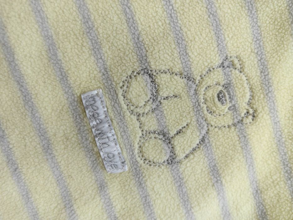 Mothercare półśpiochy śpiochy pajacyk polar czapeczka żółty 62