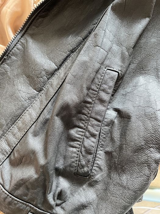 Вінтажна шкіряна куртка