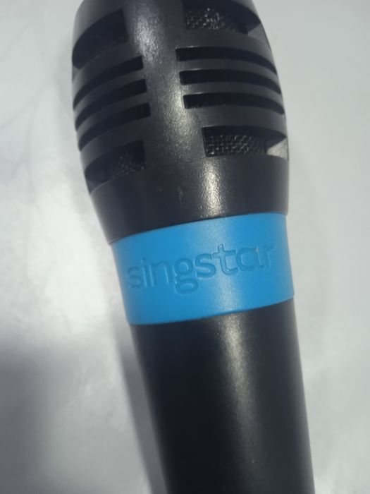 Dois microfones como novos