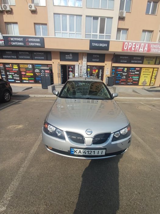 продаж нісан альмера хєтчбек