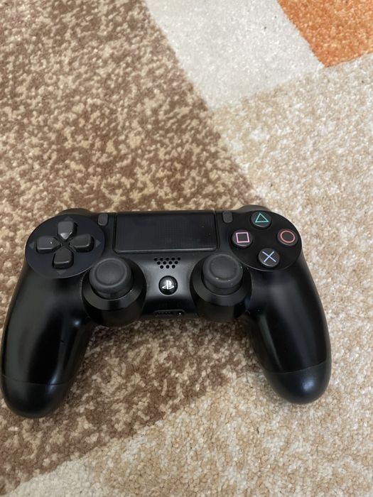 PS4(Playstation 4) Original,com dois comandos,cabos e um jogo de luta.