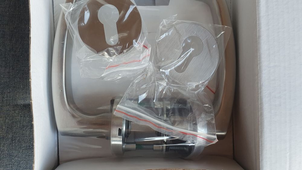 Klamka z szyldem marki HAFI