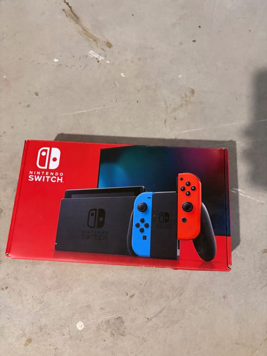 Nintendo Switch Azul/Vermelho + Bolsa Animal Crossing + Grip Joy-Con + Fatura
