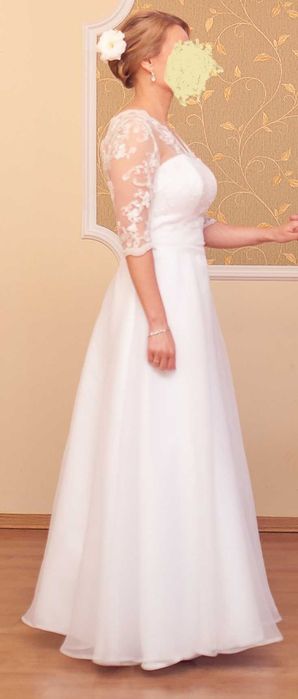 Biała suknia ślubna dla osoby z dużym biustem