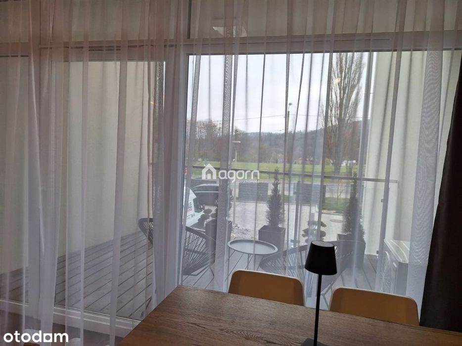 Apartamenty pod Dębowcem. Miejsce postojowe,