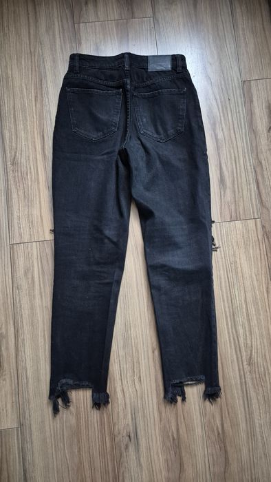 Spodnie z dziurami czarne bershka r 36