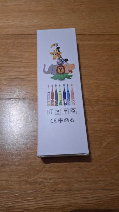 Escova de Dentes Elétrica Infantil Selada na caixa com 7 recargas