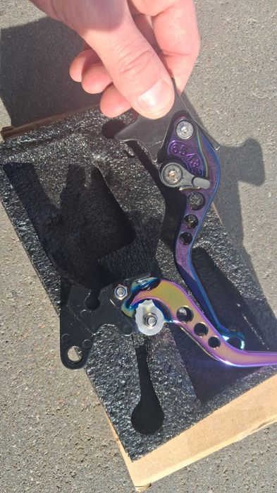 Klamki motocyklowe regulowane dzwignia