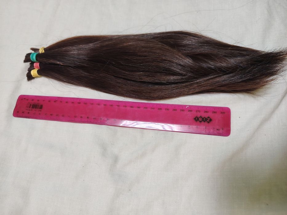 Волосся 35 см, темне .