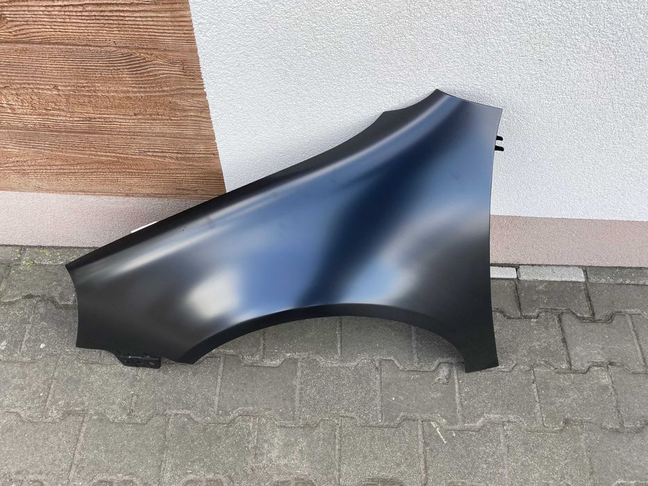 VW GOLF V 03-09 błotnik przedni lewy nowy