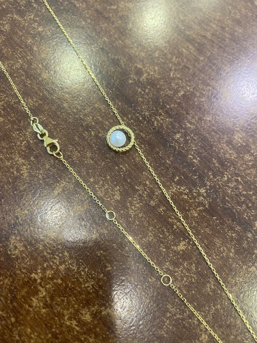 Złoty naszyjnik z perełką