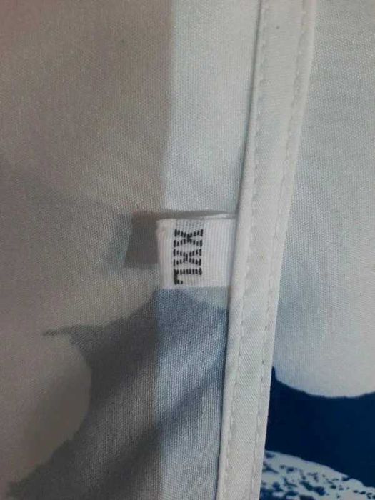 Kolorowa sukienka kopertowa