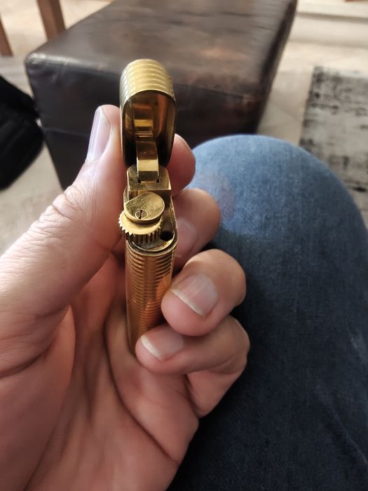Isquerio cartier em ouro anos 70