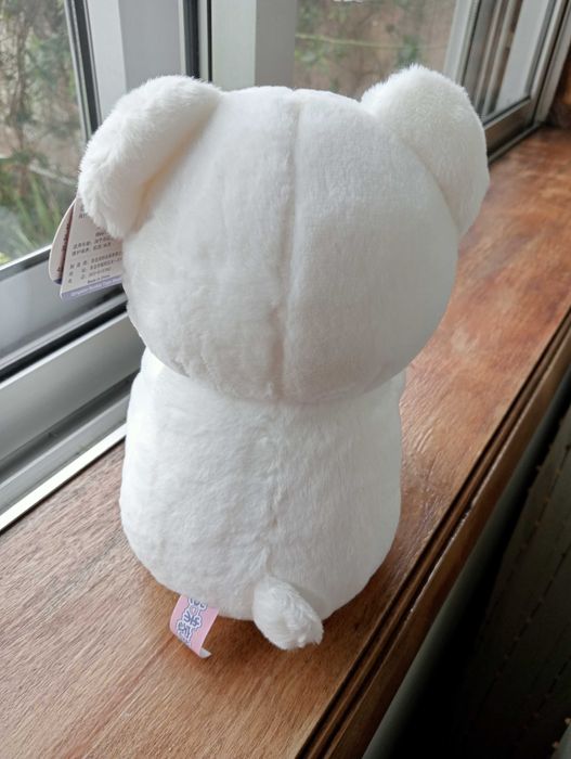 Ursinho de peluche com rosa