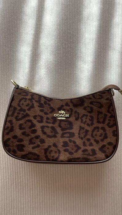 Mala coach leopardo