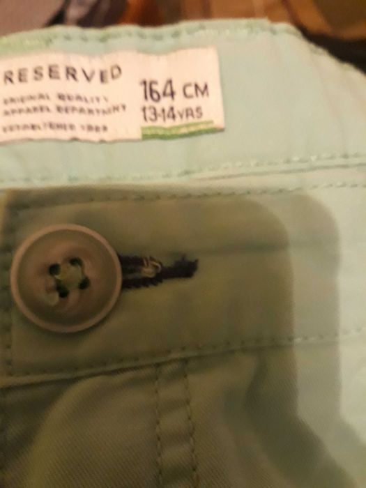 Miętowe spodnie reserved