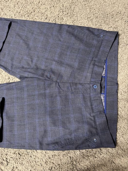 Чоловічі брюки в клітинку