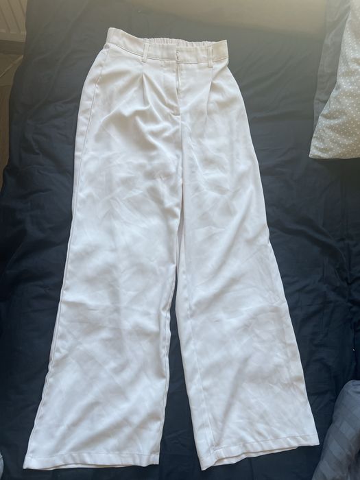 Штани білі широкі