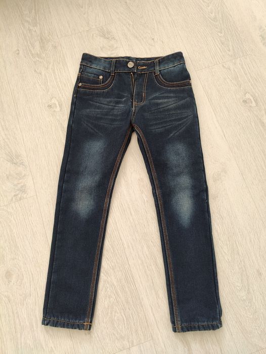 Продам нові зимові дитячі джинси 140/146