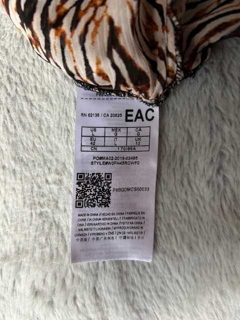 Guess Jeans Oryginalna, kobieca bluzka z ozdobnymi rękawami 40/42