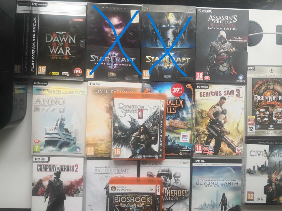 Pudełka po grach komputerowych z płytami ,instrukcjami itp.