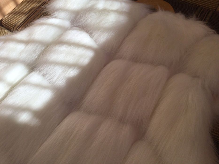 Женский меховой жилет