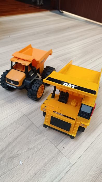 Ciężarówki wywrotki cat i JCB