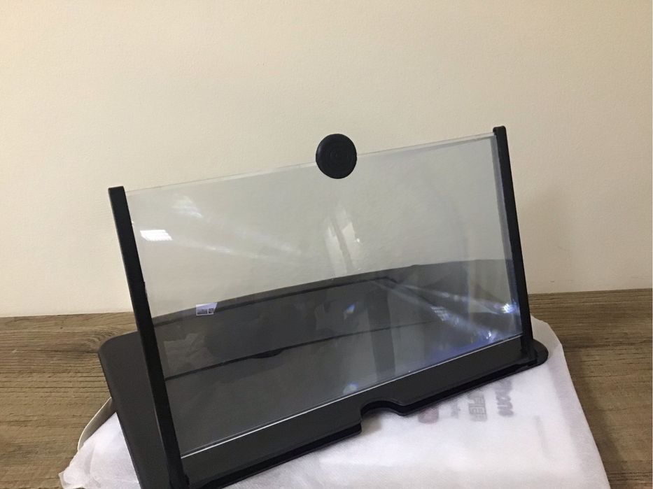 Увеличительное стекло для телефона