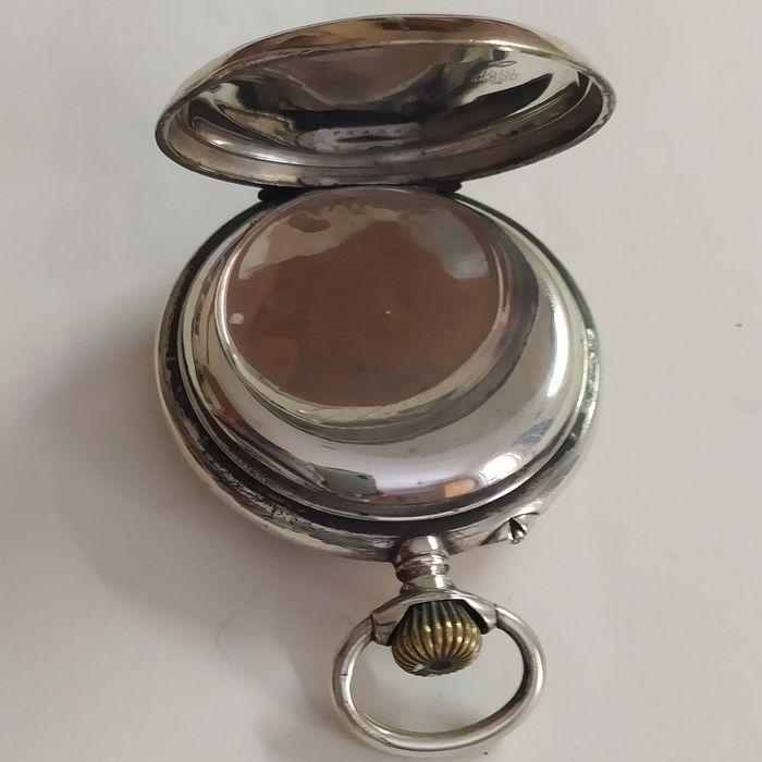 Antigo relógio de bolso em prata
