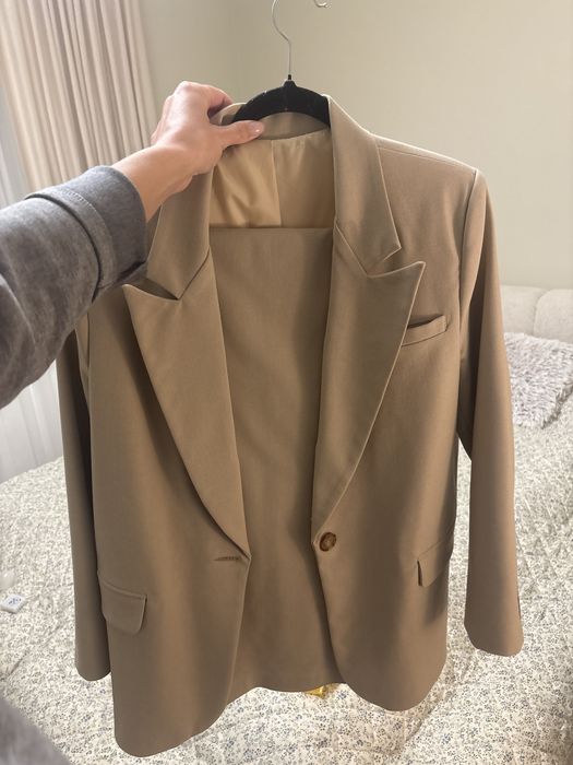 Брючні костюми бренду Merge