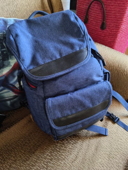 Mochila, máquina fotográfica