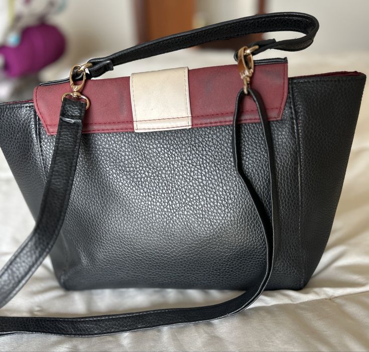 Bolsa marca Avon