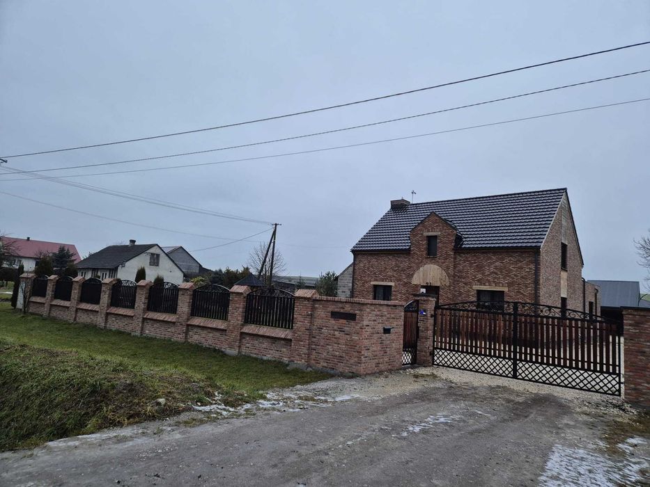 Murowanie ogrodzeń, kominów i elewacji z klinkieru cegly i kamienia