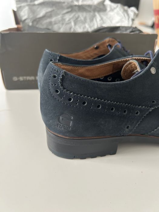 Sapatos de pele azul