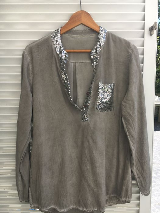 Blusa com lantejoulas