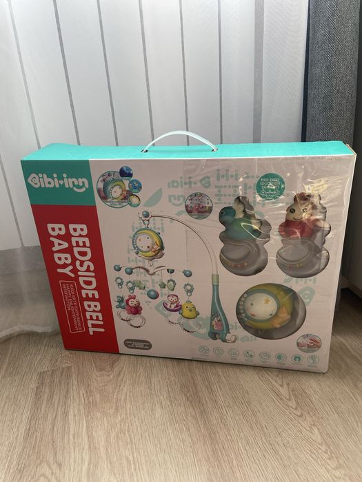 ТЕРМІНОВО!!!Музичний мобіль із карусель на ліжечко  та пультом