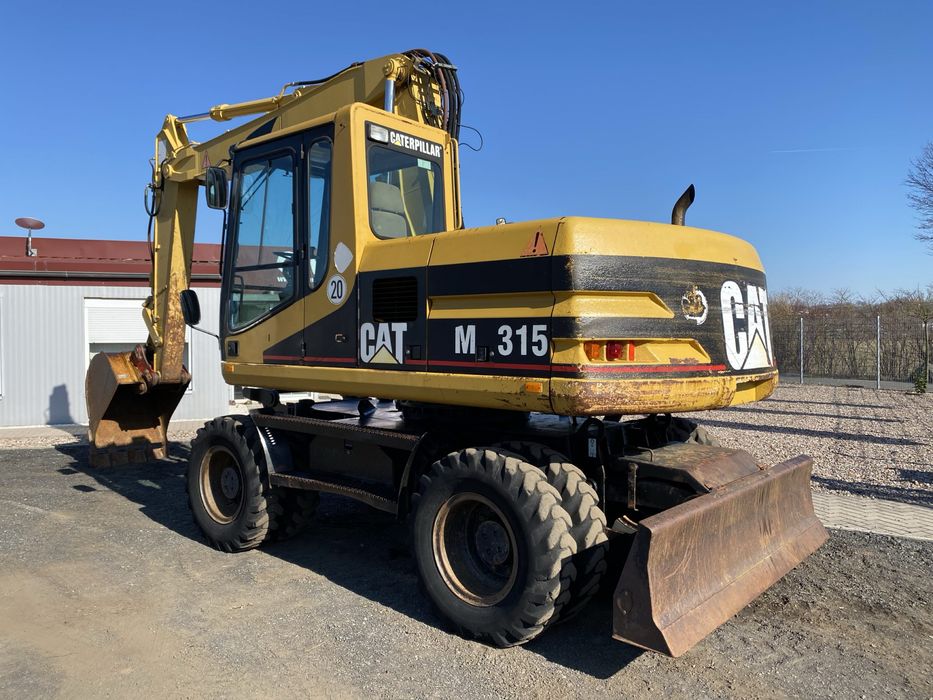 Оренда колісний екскавтор. Колесный и гусенечный экскаватор аренда