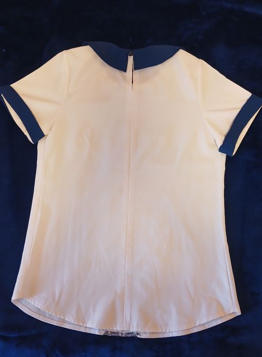 Шкільна блузка для дівчинки