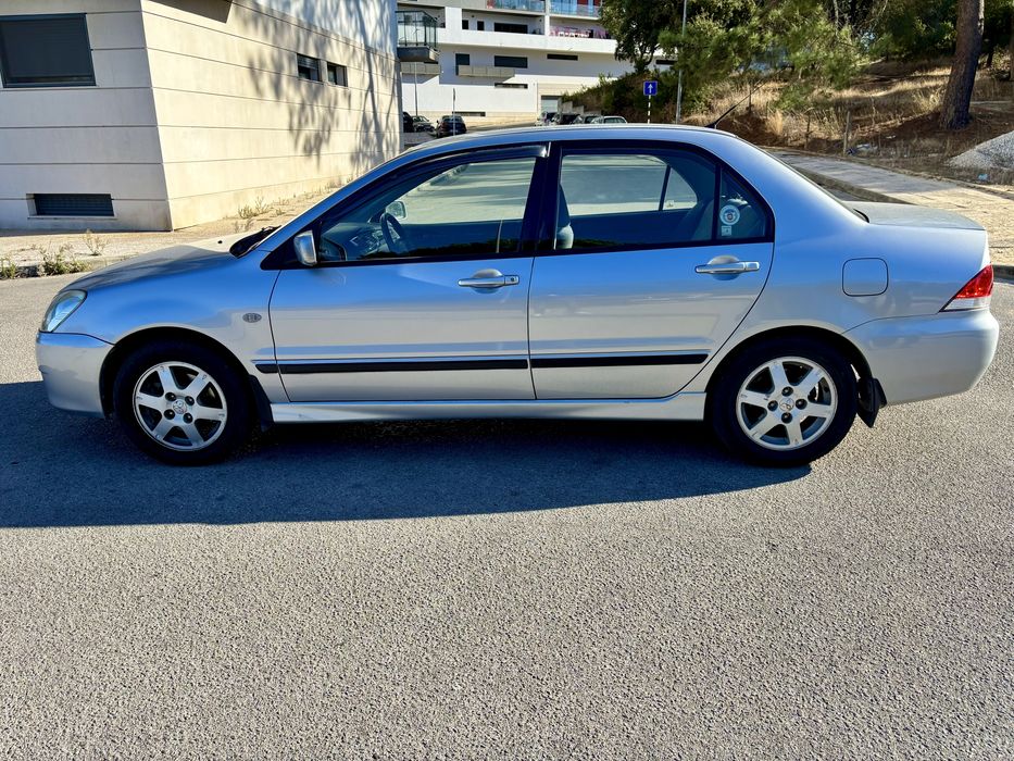 Mitsubishi Lancer 1.3 Comfort — photo 4