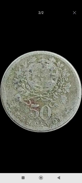 Moeda antiga de 50 centavos da república portuguesa do ano 1928.