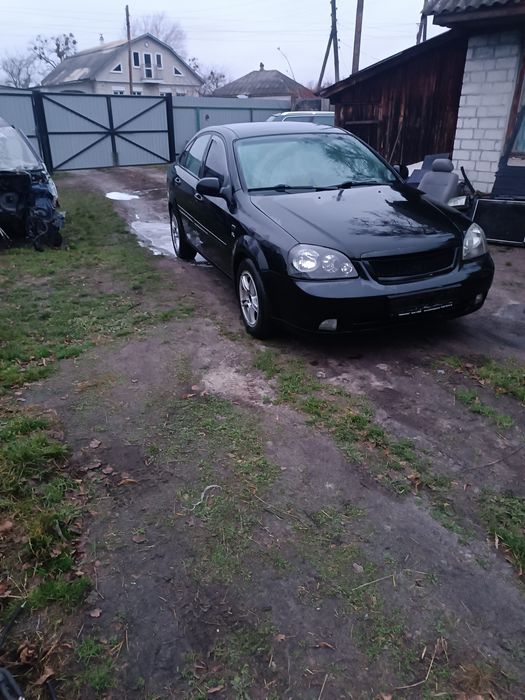 Розбірка ,запчастини Chevrolet lacetti,капот,двері,крила, двигун.