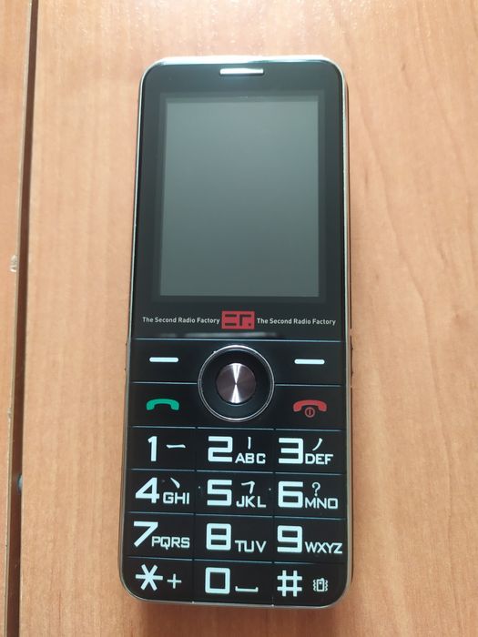 Кнопочний мобільний телефон