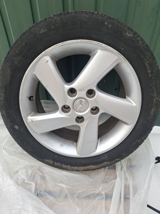 комплект  титанових дисків R16 (Mazda) з резиною Micheln 205/