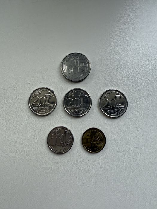 Монети фунти стерлінги сінгапур гонг конг емірати