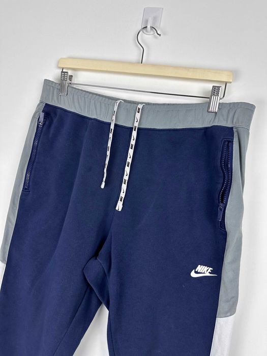 Spodnie dresowe Nike bawełniane granatowe r. L